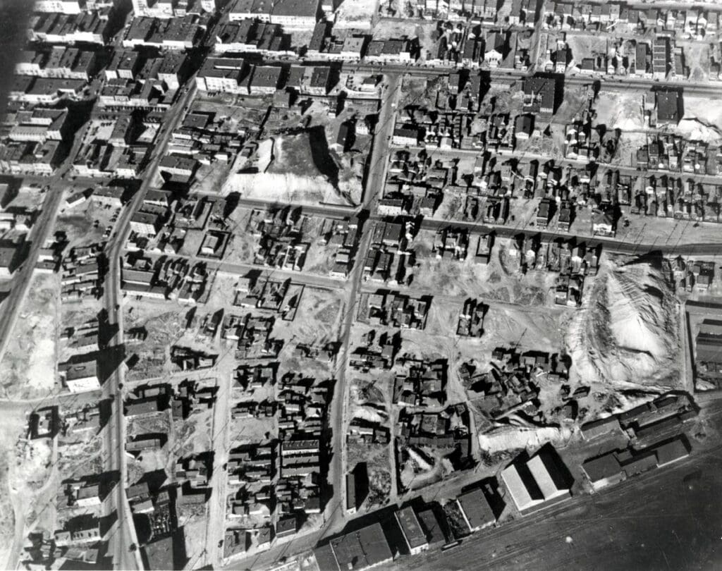 Mines - Aerial view of the Cabbage Patch area (around East Second Street and Garden Avenue), the Colorado Mine and the Davis-Daly dump, Butte, MT (similar to 1341) Circa 1930