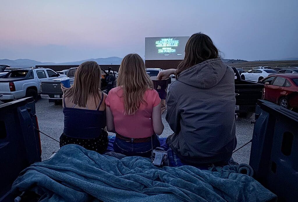 Three people enjoying the Silver Bow Drive In in Butte Mt